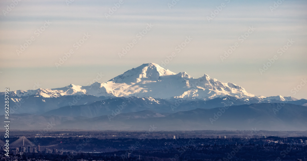 Mount Baker in the distance behind Vancouver City. BC, Canada. Mount Baker in the distance behind Vancouver City. BC, Canada.