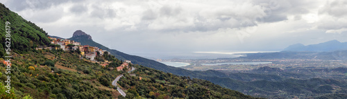 Small Touristic Town, Baunei, in the Mountains of Sardinia, Italy. Cloudy Rainy Day. Fall Season. Panorama © edb3_16
