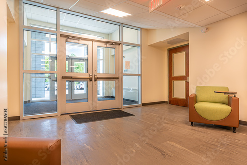 Typical entrance vestibule found at a business, office, or institutional building with aluminum doors.