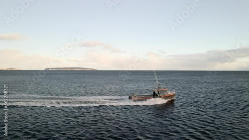 Lobster fishing boat in harbour photo
