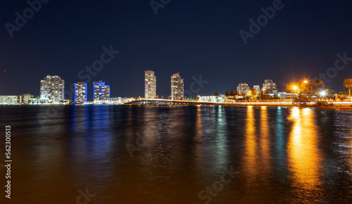 Night panoramic photo of Miami landscape. Bayside Marketplace Miami Downtown behind MacArthur Causeway from Venetian Causeway.