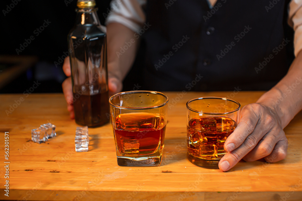 Bartender Serve Whiskey, on wood bar, Bartender Serve Whiskey, on wood bar,