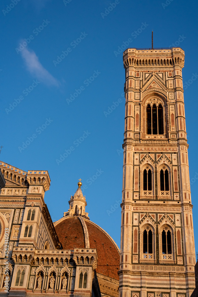 Low angle view of the cathedral against blue sky. Sunset. Florence. Close up	