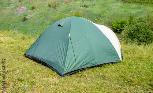 Tourist tent in the park in nature.