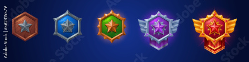 Cartoon set of game badges of different rank isolated on dark blue background. Vector illustration of hexagon medals with star, wooden, stone, golden, silver metal textures. Collection of level awards