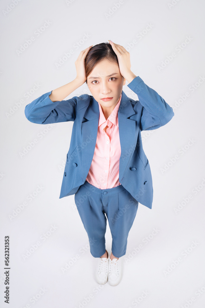 Full length image of young Asian businesswoman Full length image of young Asian businesswoman