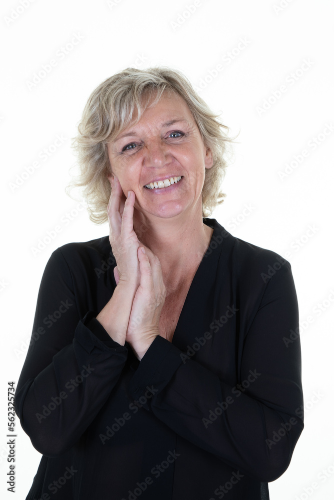 pretty smiling blonde cute middle aged woman senior portrait hand fingers on chin looking face in white background pretty smiling blonde cute middle aged woman senior portrait hand fingers on chin looking face in white background