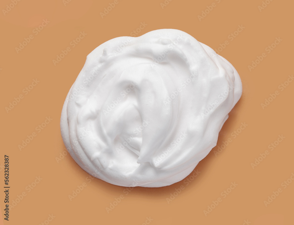 Shaving cream isolated on brown color background Shaving cream isolated on brown color background