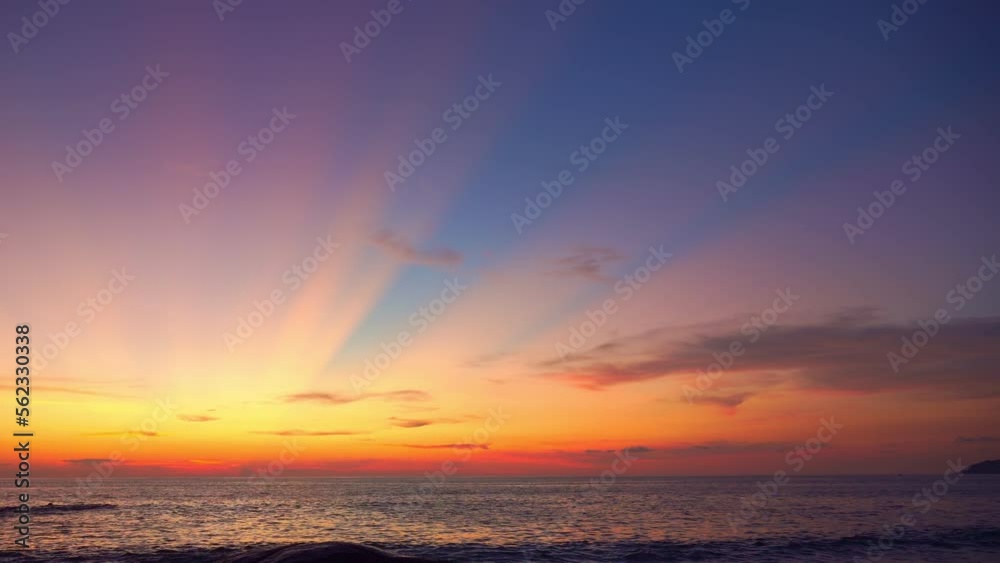 A beautiful sight of beams of light rising into the sky at dusk..sweet sky in sunset above the ocean at Karon beach Phuket. .Sunset with sweet color light rays and other atmospheric effects. A beautiful sight of beams of light rising into the sky at dusk..sweet sky in sunset above the ocean at Karon beach Phuket. .Sunset with sweet color light rays and other atmospheric effects.