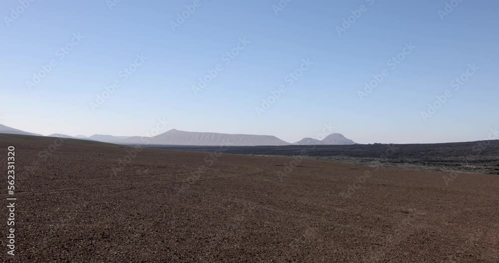 Views across the black lava volcano field of Jabal Qidr in the Harrat Khaybar region, north west Saudi Arabia Views across the black lava volcano field of Jabal Qidr in the Harrat Khaybar region, north west Saudi Arabia
