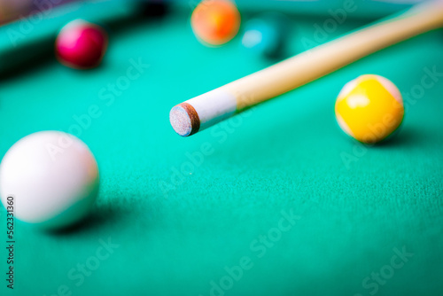 Billiard snooker balls composition on the green pool table. Gambling game of Billiards.