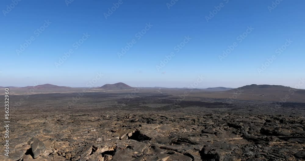 Views across the black lava volcano field of Jabal Qidr in the Harrat Khaybar region, north west Saudi Arabia
