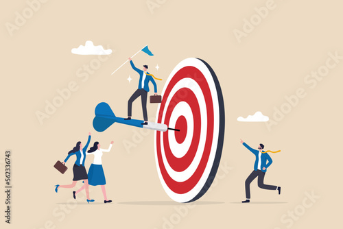 Achievement, reaching goal or meet target, winning business challenge, success or teamwork helping to achieve target concept, success businessman holding winning flag on dart hitting bullseye target.