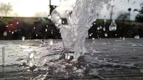 glass with water in slow motion