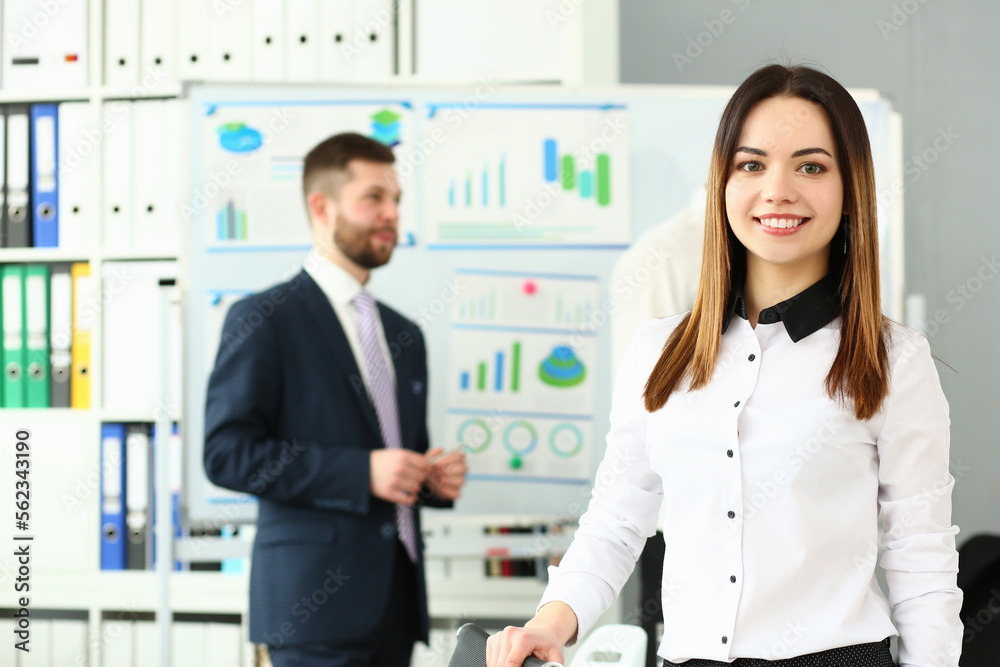 Beautiful smiling woman on training in marketing and analytics Beautiful smiling woman on training in marketing and analytics