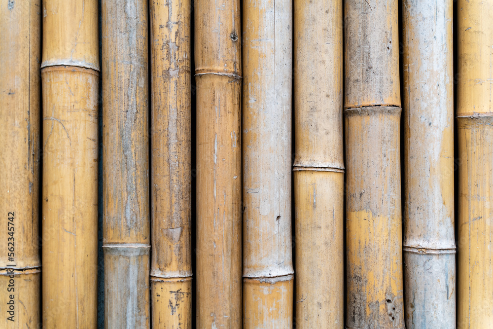 brown round bamboo fence background with many grooves brown round bamboo fence background with many grooves