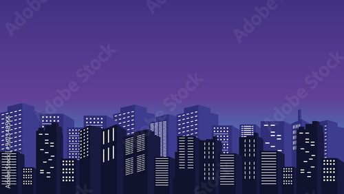 Night silhouette of the city with tall mall buildings