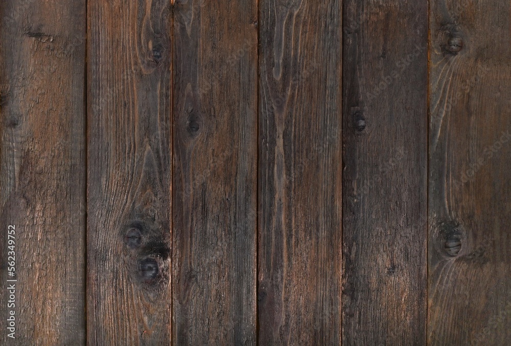 dark brown boards with knots with a natural pattern dark brown boards with knots with a natural pattern