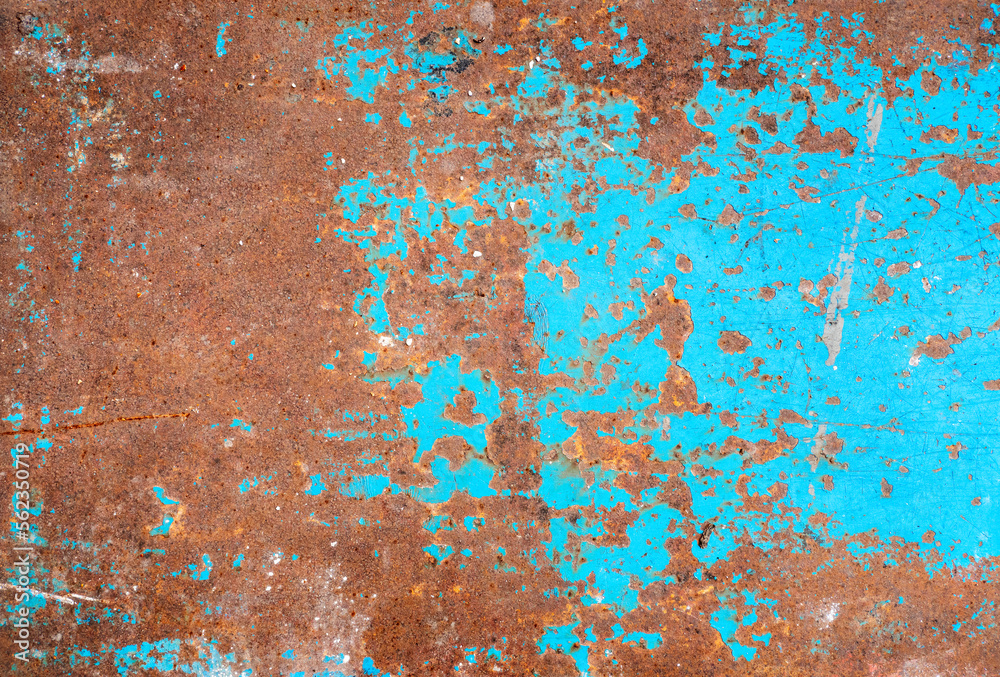 Rusted iron sheet, panel with old blue paint on surface as texture or background Rusted iron sheet, panel with old blue paint on surface as texture or background