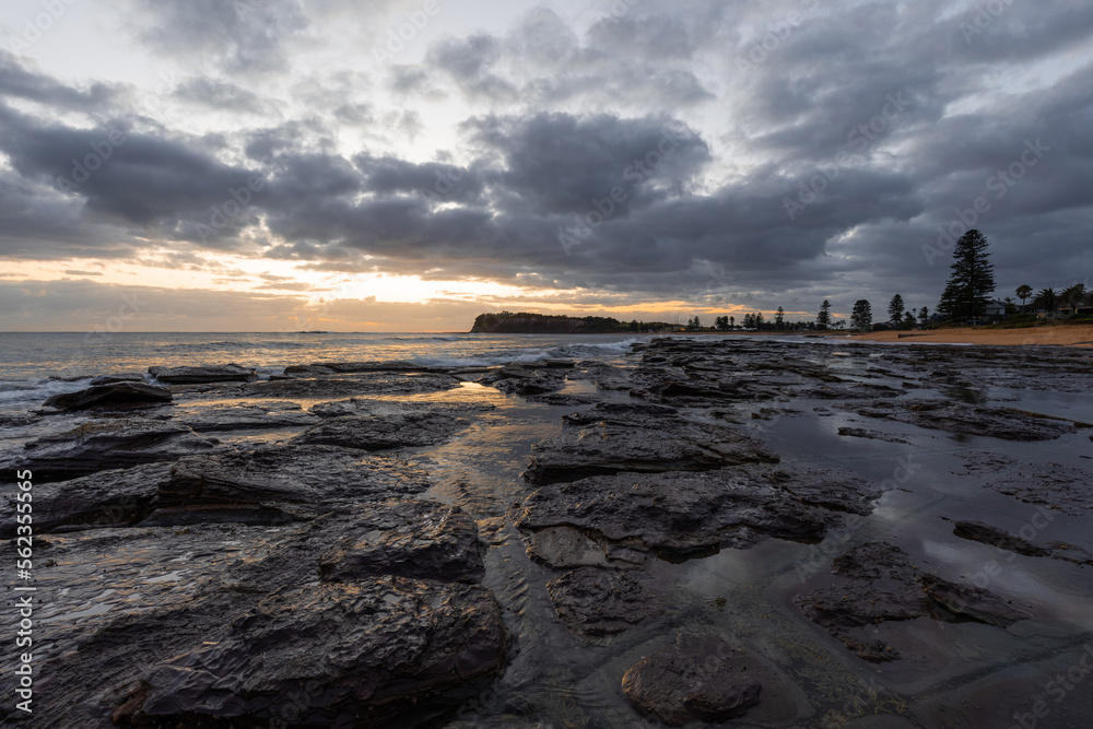 Rocky formation on Collaroy Beach coastline, Sydney, Australia.