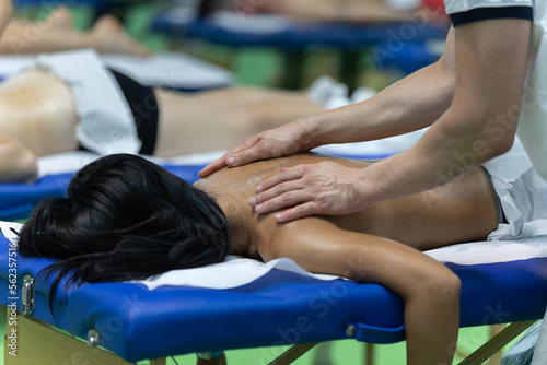 Athlete's Back Massage after Fitness Activity - Wellness and Sport