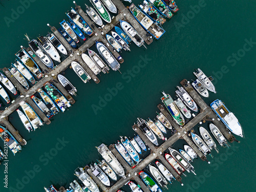 Top down view of boats docked in Tamsui Fisherman's Wharf, New Taipei City, Taiwan.