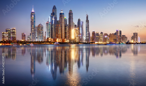 Sunset view of the Dubai Marina and JBR area and golden sand beaches in the Persian Gulf. Holidays and vacations in the UAE