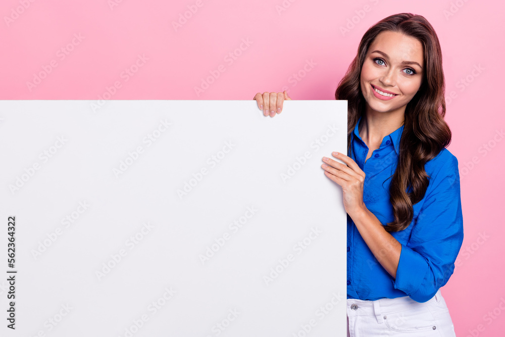 Photo of positive pretty lady wear trendy clothes presenting empty space special deal low price isolated on pink color background Photo of positive pretty lady wear trendy clothes presenting empty space special deal low price isolated on pink color background