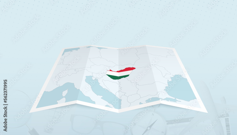 Obraz premium Map of Hungary with the flag of Hungary in the contour of the map on a trip abstract backdrop.