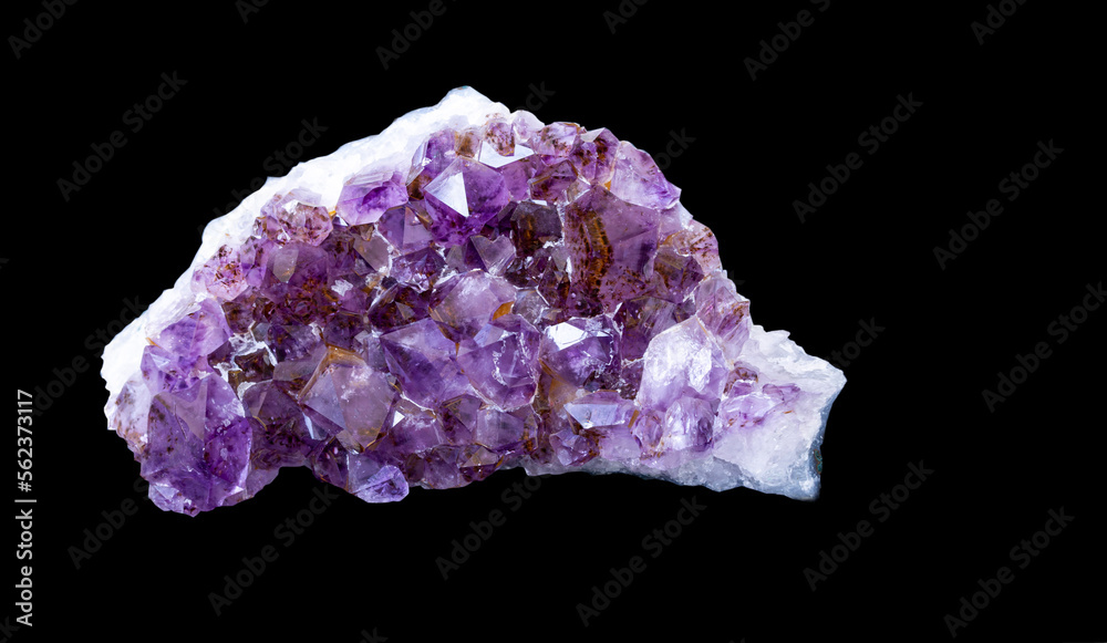 Magnificent amethyst on a black background with copy space. Jewelry, gemology, geology.