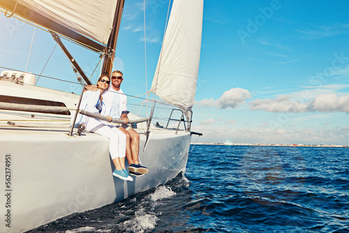 Sea, portrait and mature couple on a yacht for adventure, holiday freedom and sailing trip. Travel, summer and man and woman with sunglasses on a boat in ocean for romantic seaside holiday in Greece.