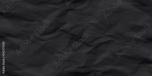 Black creased crumpled paper texture can be use as background. Ragged black Paper. black waxed packing paper texture.