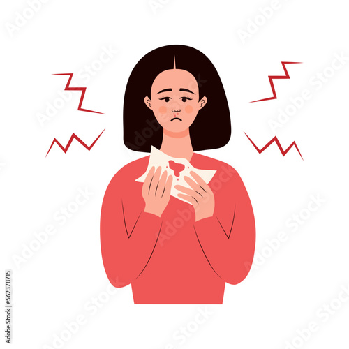 Sad woman with a nosebleed holding napkin. Nasal bleeding, disease, health problem concept.