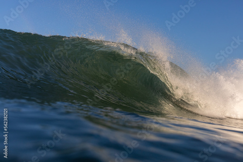 huge waves breaking on the beach