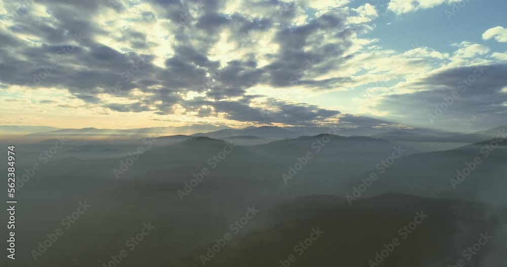 Abstract aerial view of coal power plant high pipes with black smoke moving up polluting atmosphere at sunny day Abstract aerial view of coal power plant high pipes with black smoke moving up polluting atmosphere at sunny day