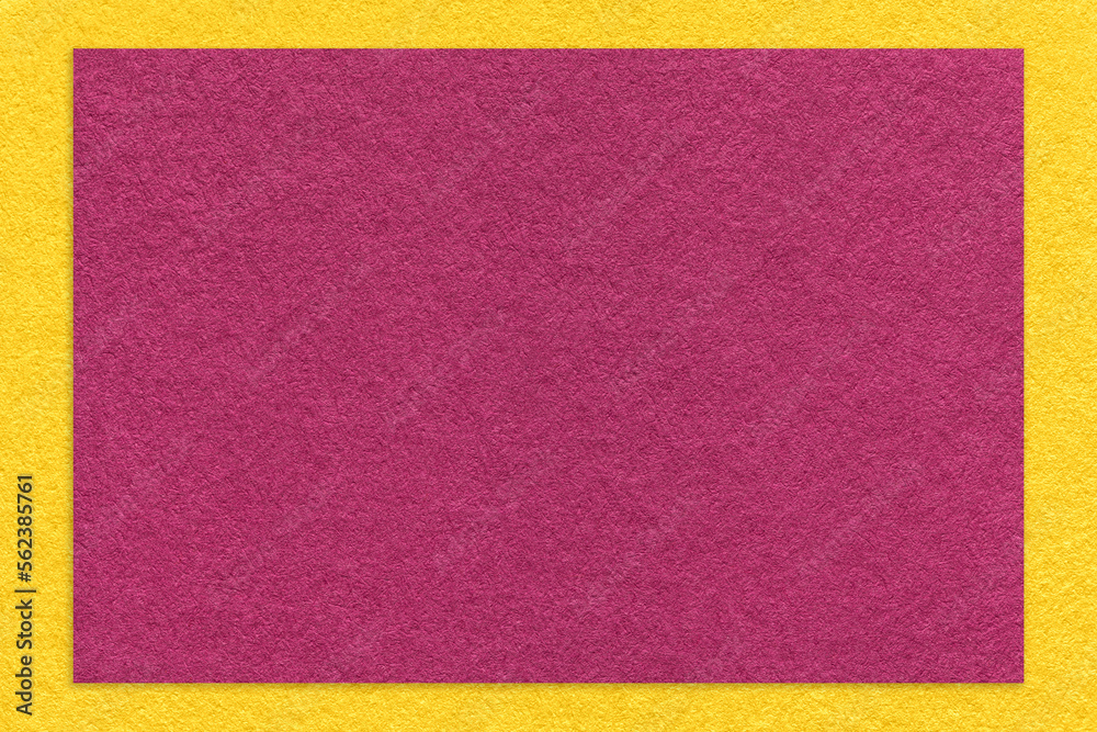 Texture of craft purple color paper background with yellow border, macro. Vintage dense kraft wine cardboard Texture of craft purple color paper background with yellow border, macro. Vintage dense kraft wine cardboard