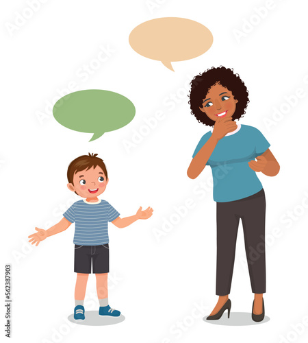 Young African woman talking to cute little boy having conversation with speech bubbles