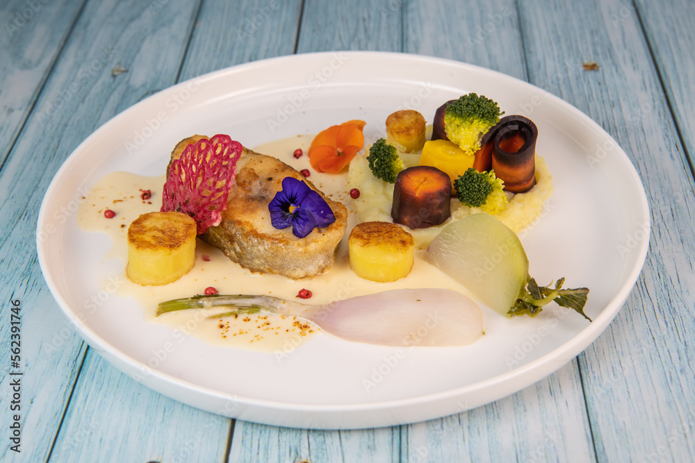 Recipe of cod steak, mashed potatoes and its farandole of vegetables, parsnip, turnip, broccoli, candied potato. High quality photo Recipe of cod steak, mashed potatoes and its farandole of vegetables, parsnip, turnip, broccoli, candied potato. High quality photo