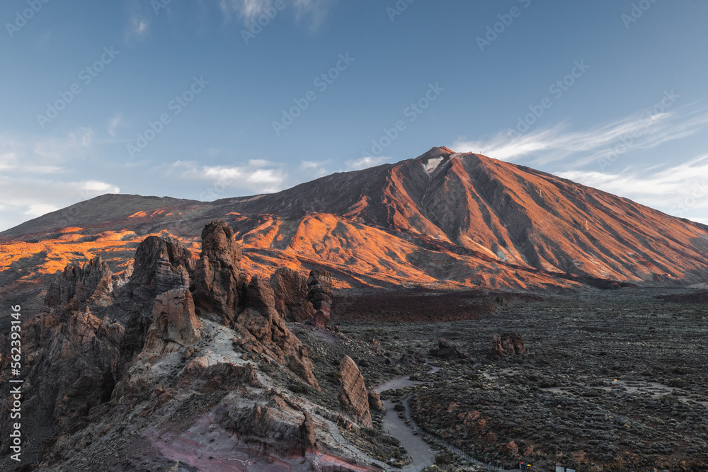 View of Teide volcano during sunrise from Roques de Garcia viewpoint in Teide National Park, Tenerife.