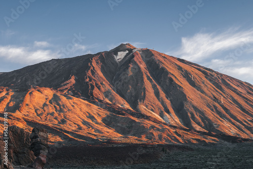 View of Teide volcano during sunrise from Roques de Garcia viewpoint in Teide National Park, Tenerife.