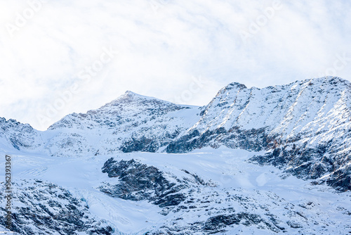 Fototapeta Naklejka Na Ścianę i Meble -  View of snow covered rocky mountains during winter in Switzerland. 