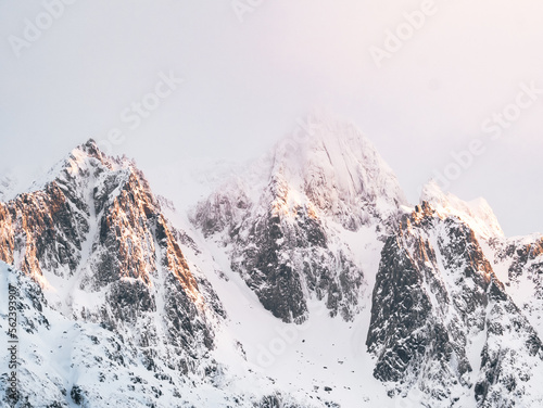 View of winter snowy mountain peaks in Lofoten, Norway.