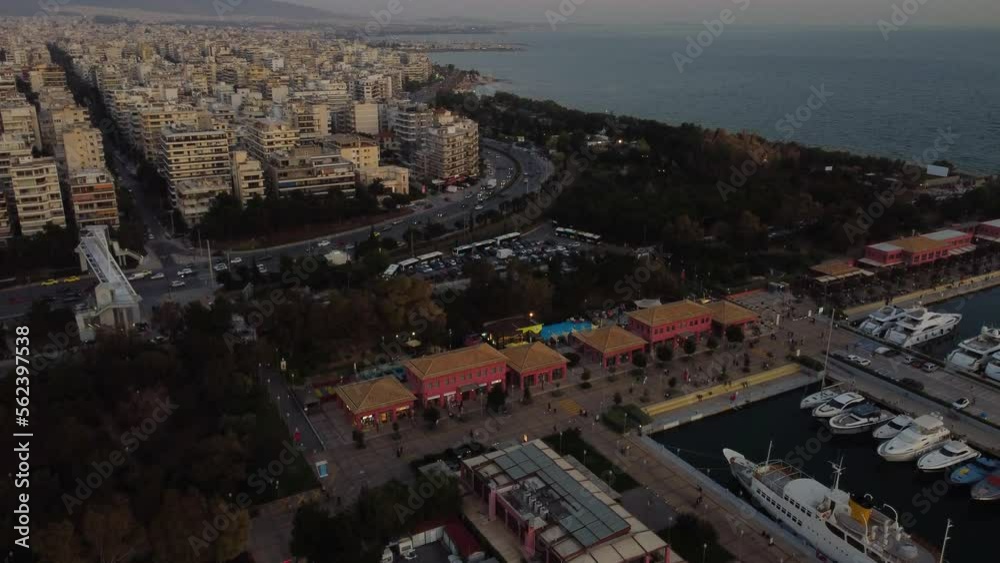 Aerial View of Flisvos Marina and Coastal Traffic in Athens, Greece at Twilight, Drone Shot Aerial View of Flisvos Marina and Coastal Traffic in Athens, Greece at Twilight, Drone Shot