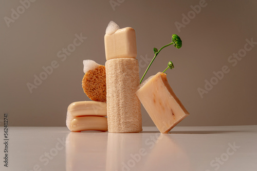 Elegant Still Life of premium natural bath products shot in studio with flower decor photo