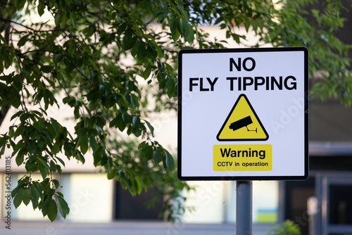 No fly tipping sign on roadside photo