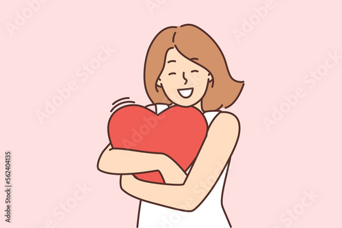 Happy woman hold heart in hands 