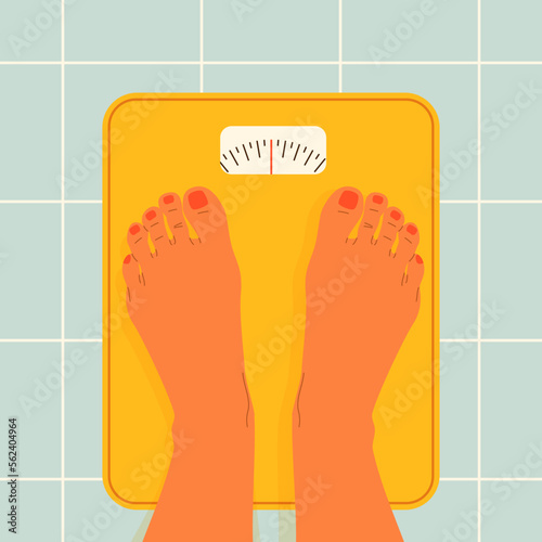 The girl stands on the scales