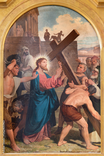 VARALLO, ITALY - JULY 17, 2022: The painting Jesus carries his cross in the church Collegiata di San Gaudenzio by Enrico Reffo from end of 19. cent.