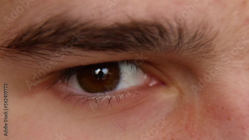 The guy's look expresses disbelief, doubt and suspicion. A shifty look young man