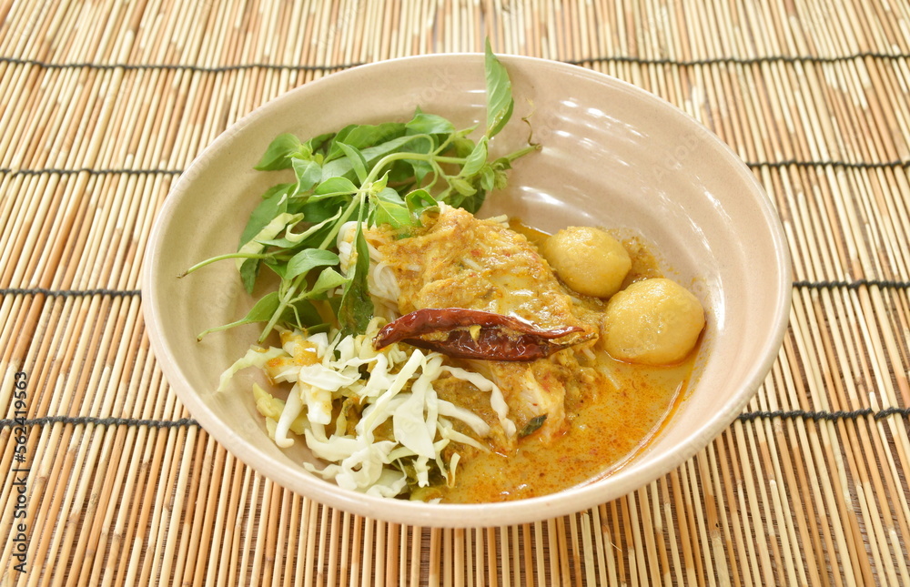 rice noodles on bowl with spicy fish curry sauce and fresh vegetable rice noodles on bowl with spicy fish curry sauce and fresh vegetable